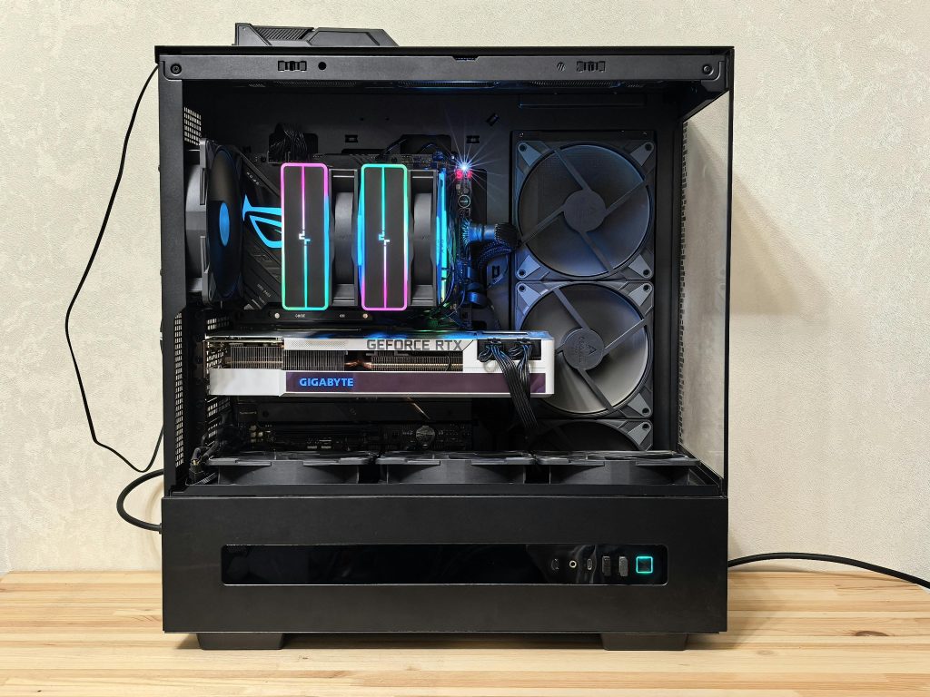 Close-up of a gaming PC with RGB lights and advanced cooling system.